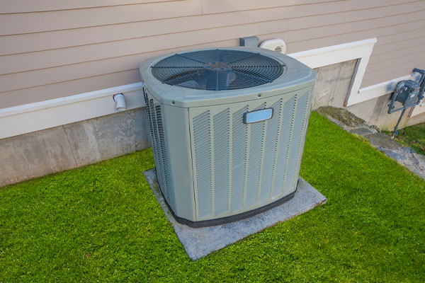 Outdoor AC condenser unit on the North Shore MA